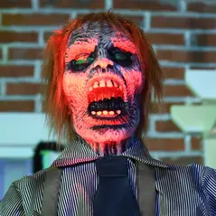 HOMCOM 5.5ft Life Size Halloween Animatronic Standing Chainsaw Killer, with Light Up Eyes, Sound Activated Moving Body, Scary Halloween Decorations, Battery Operated, Indoor Party Props - 8